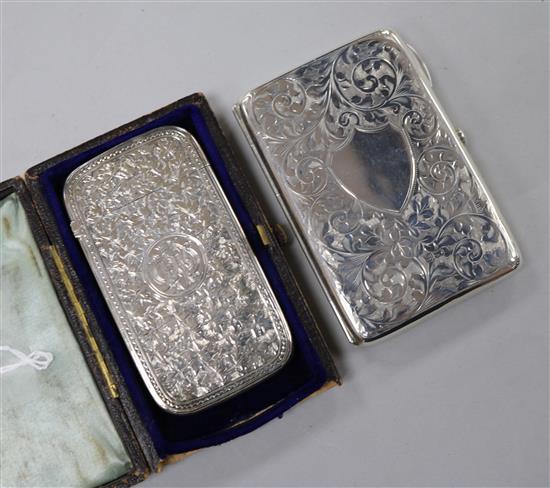A Victorian engraved silver card case and an Edwardian silver purse.